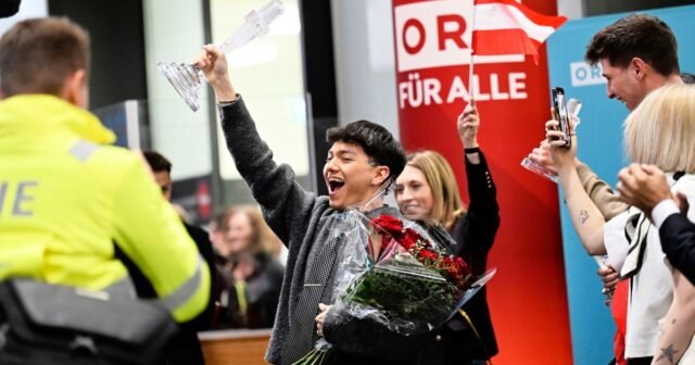 AP Photos: Austria da la bienvenida a JJ a casa después de ganar el concurso de canciones de Eurovisión
