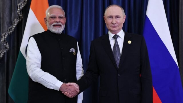 El primer ministro indio, Modi y Putin, se reúnen al margen de la cumbre regional en China
